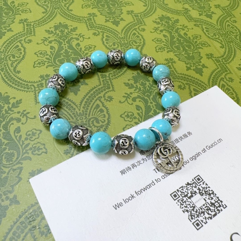 G*u*i bracelets